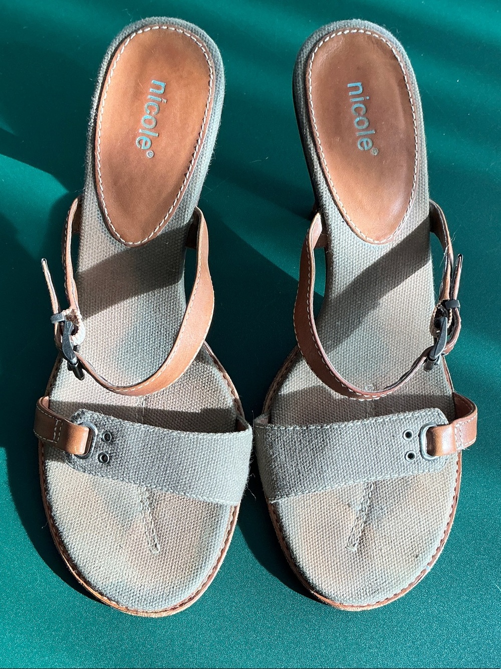 Nicole featuring an olive-green fabric upper and brown leather strappy accents